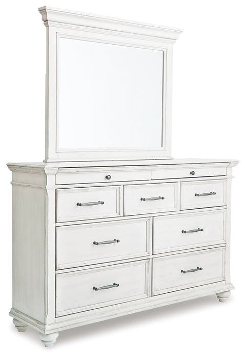 Kanwyn Queen Panel Bed with Mirrored Dresser and Chest